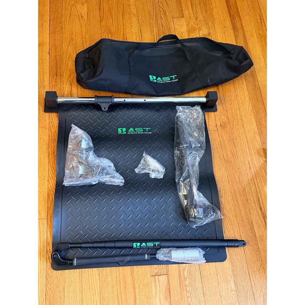 AST Automatic Swing Trainer Golf Training Aid System w/ Base Mat and Travel Bag